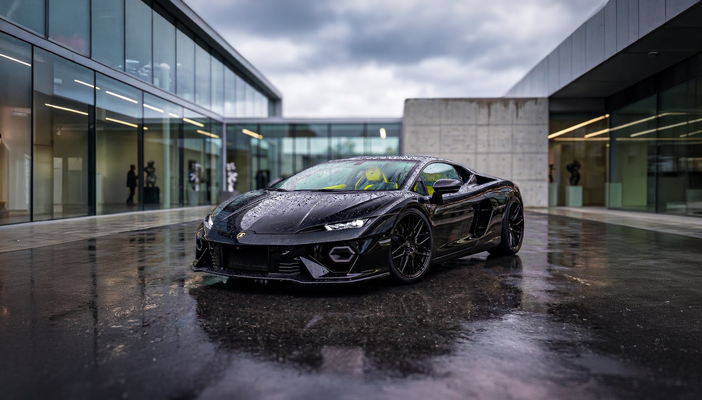 Custom Lamborghini Temerario Nero Noctis with contrast giallo taurus leather-and LF-82R Forged Custom Wheels with downpipe front side view by LOMA Refined.
