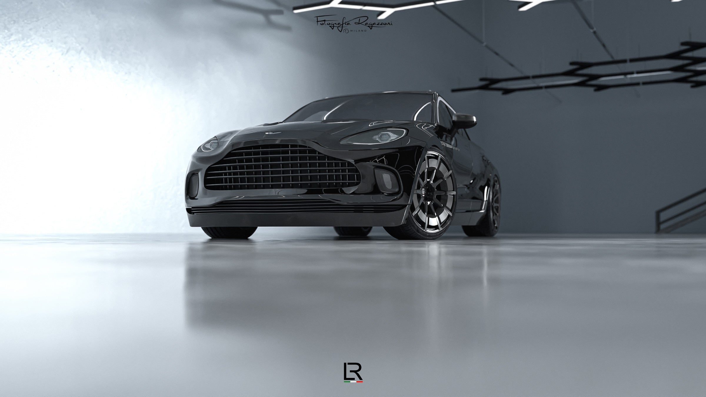 LOMA-Refined-Aston-Martin-DBX-showroom-pic-with-custom-wheels-and-suspension.