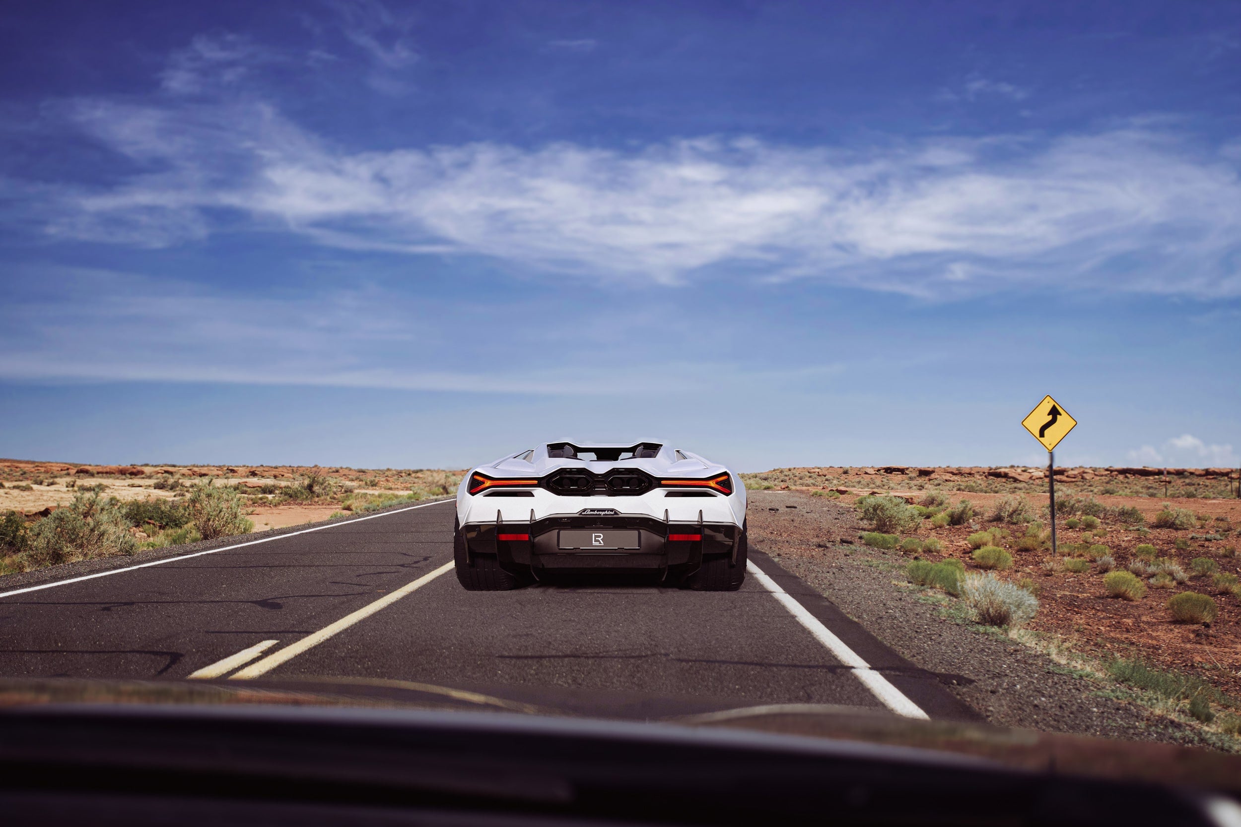 LOMA-Refined-Lamborghini-Revuelto-showcasing-catless-downpipe-exhaust-and-22-inch-custom-forged-wheels-with-centerlock-design-min.