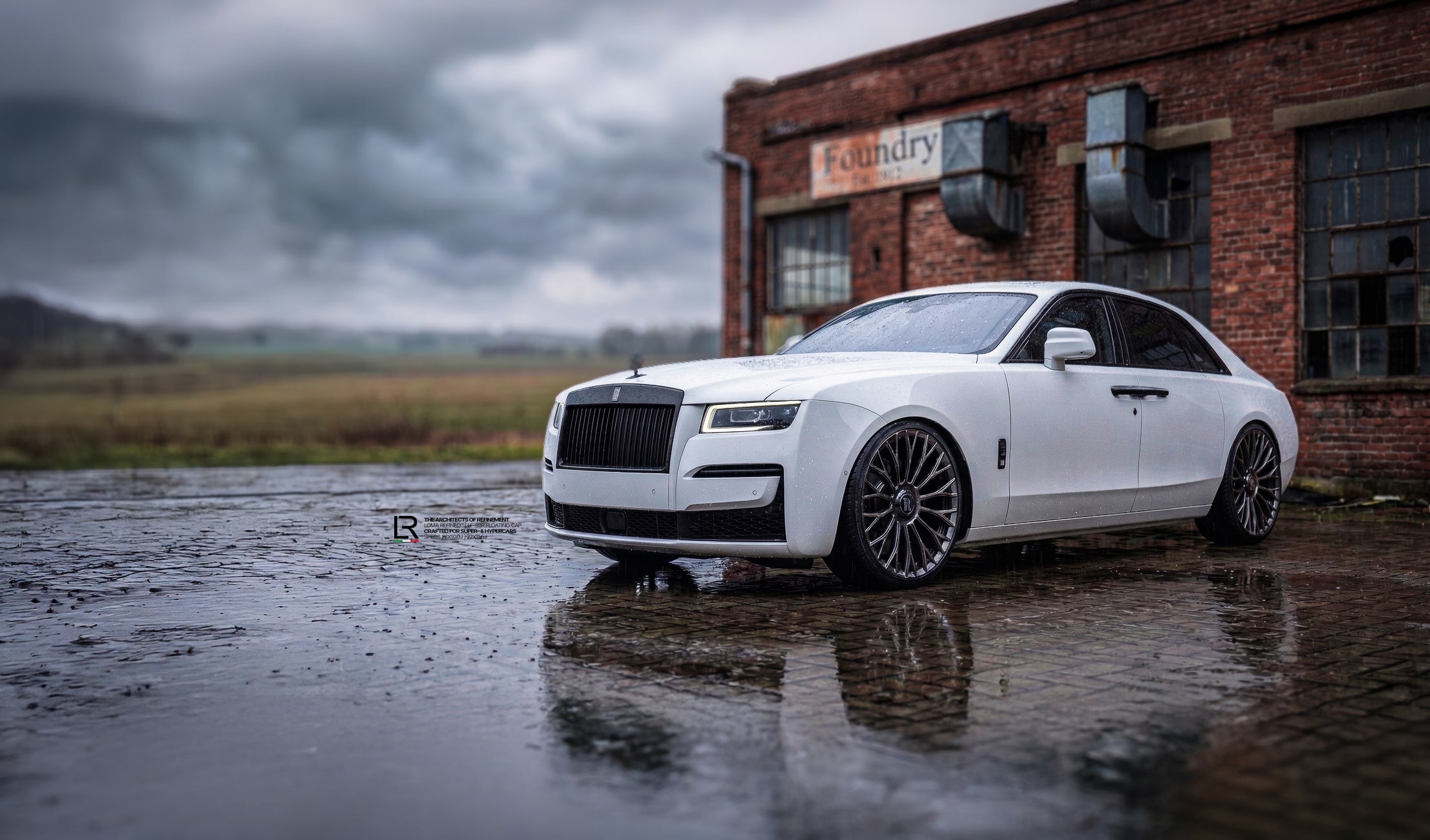 2026-Rolls-Royce-Ghost-on-22-Inch-custom-rims-by-LOMA-Refined-front-side-view-wallpaper.