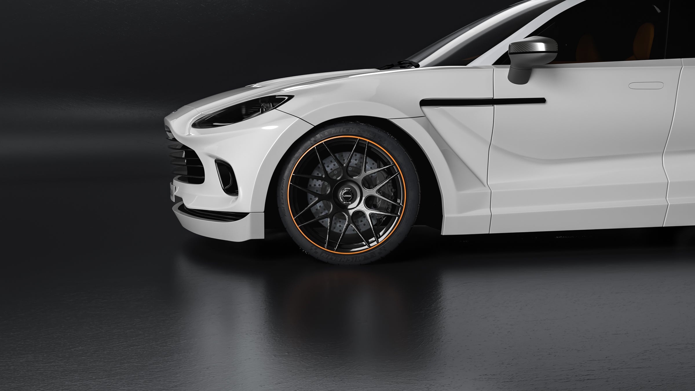 LOMA_Refined_Aston_Martin_DBX_front_closeup_of_the_front_wheel