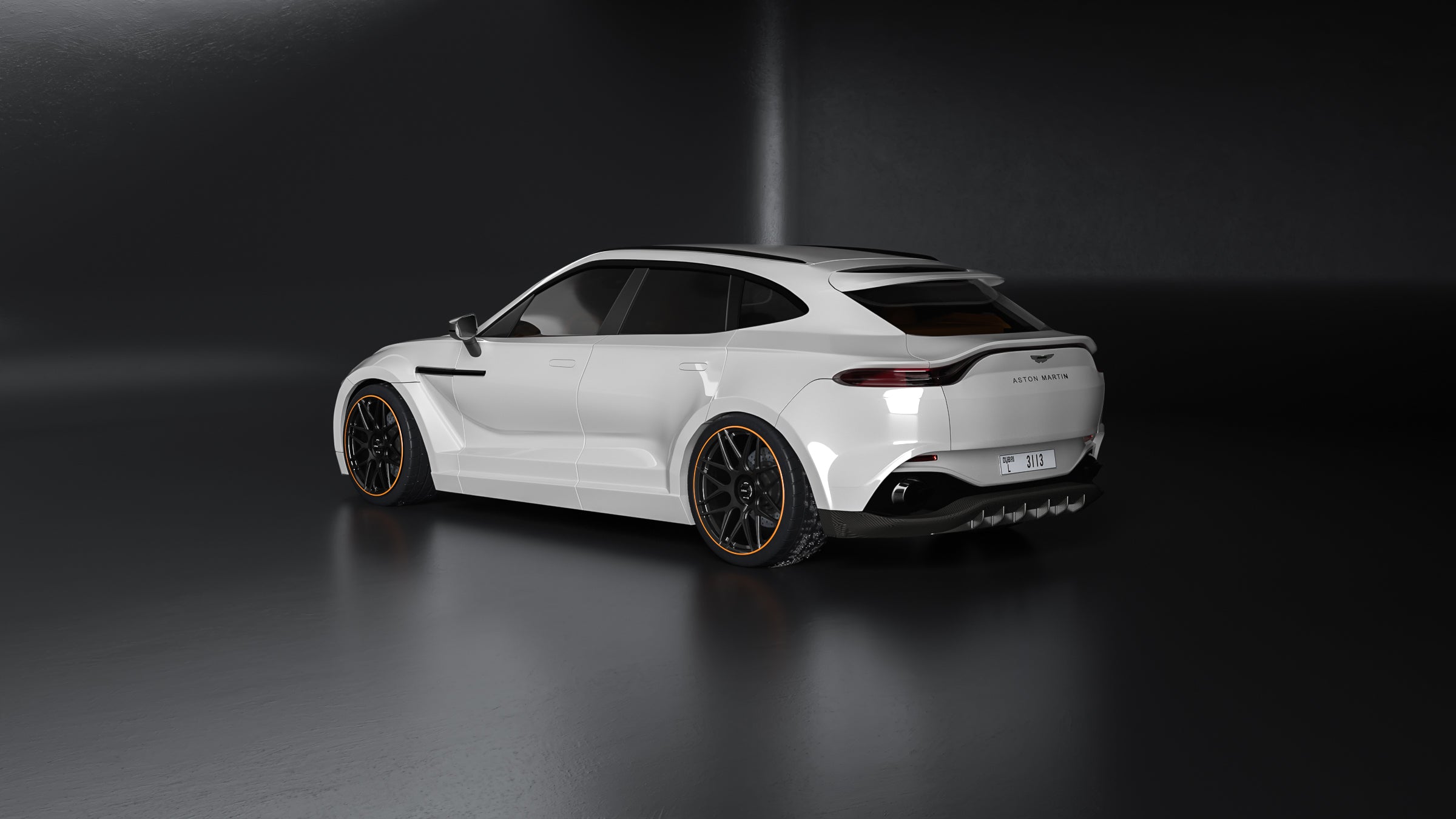 LOMA_Refined_Aston_Martin_DBX_rear_side_view_sitting_on_centerlock_wheels
