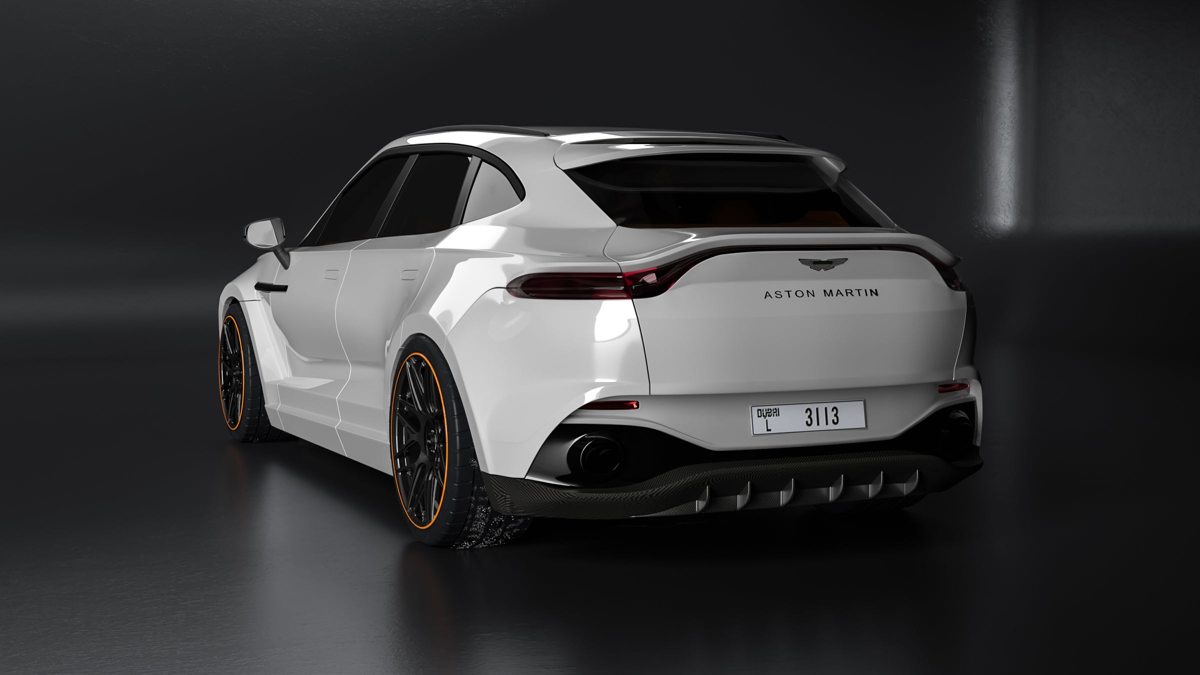 LOMA_Refined_Aston_Martin_DBX_rear_view_showing_the_rims_downpipe_stage_2_and_sport_exhaust